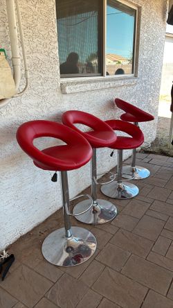 4 red patio chairs