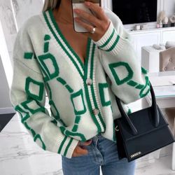 White and green cardigan sweater