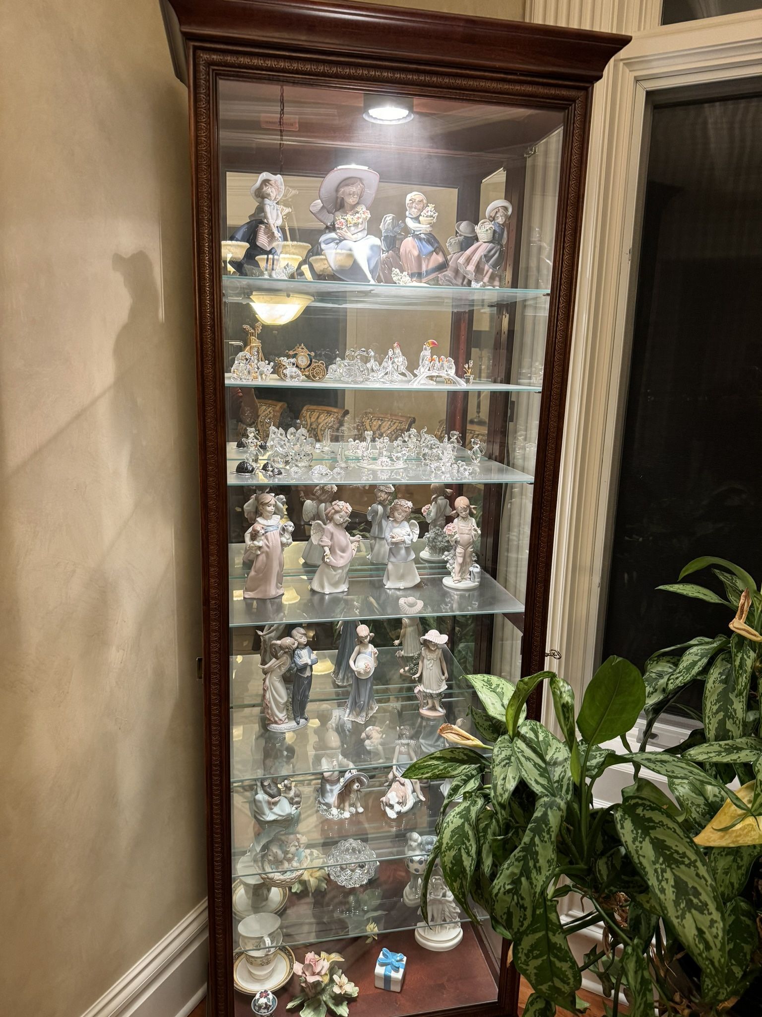 Curio Cabinet By Howard Miller.
