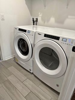 One year old washer, and electric dryer By Whirlpool