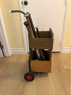 Vintage wooden handcrafted baseball bat cart