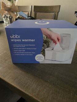 NEW BABY WIPE WARMER IN BOX NEVER USED COMPLETELY SEALD
