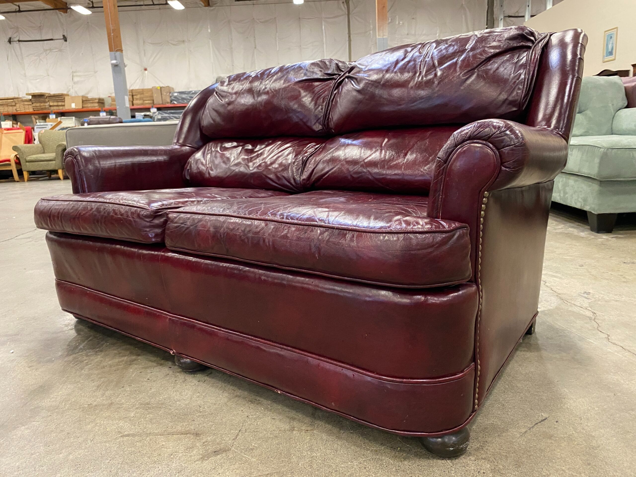 ETHAN ALLEN Vintage Oxblood Leather Chesterfield Loveseat with Studded Accents