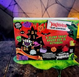 Compound Kings Halloween Slime Countdown Calendar 31 Doors/Open Daily/Halloween. This is a Compound Kings Halloween Slime Countdown Calendar that feat