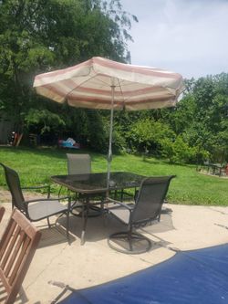 A table and three chairs.