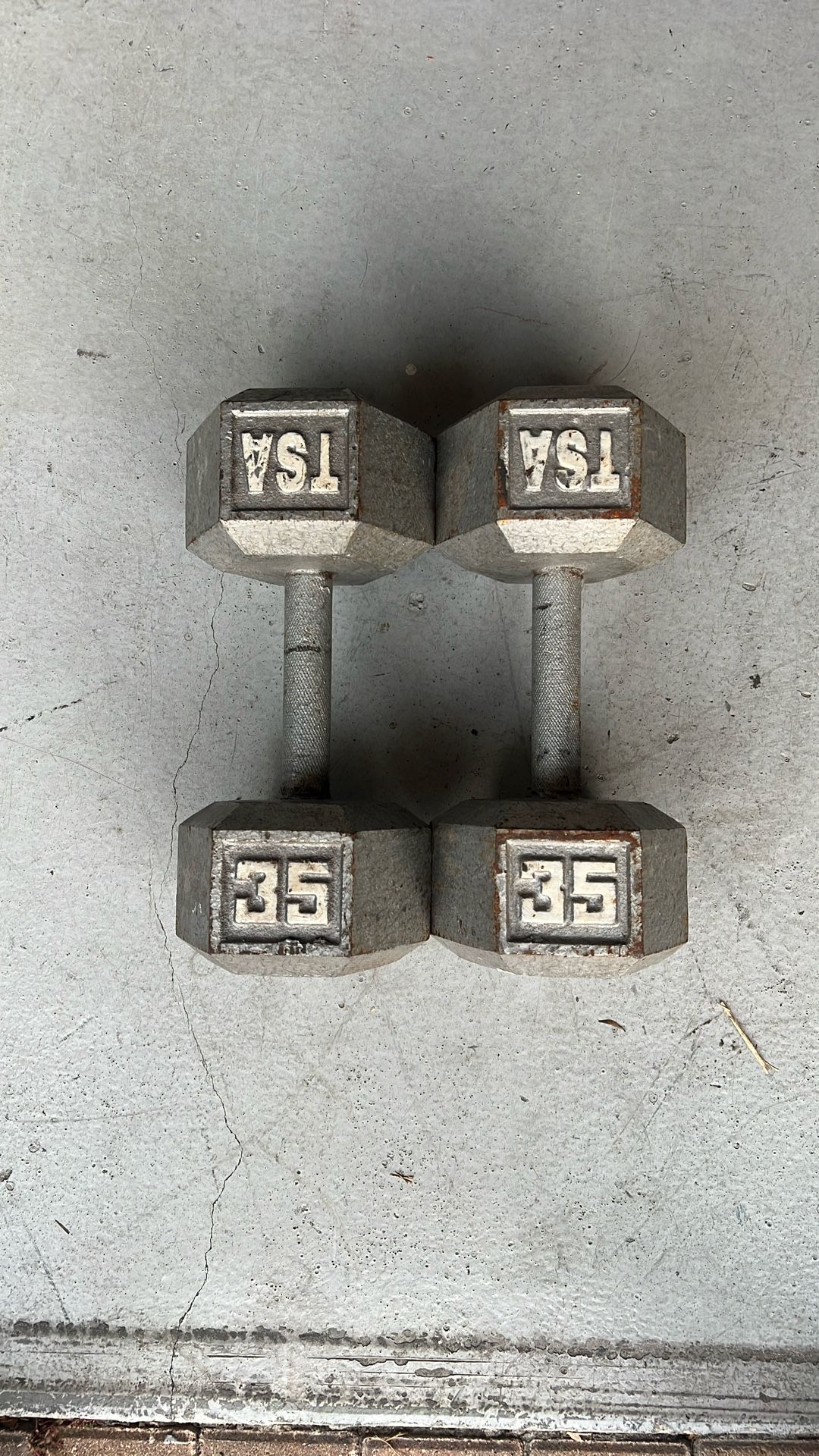 A Pair Of 35 Lb TSA Hex Dumbbells