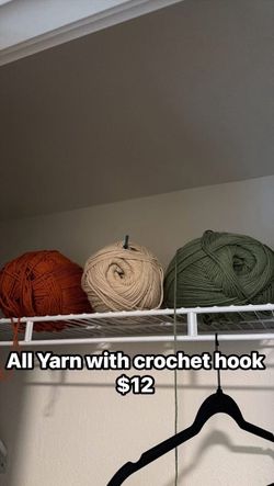 3 Yarn Balls with Crochet Hook