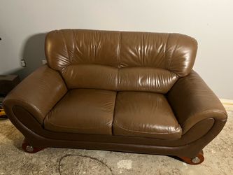 Brown couch two seater