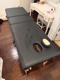 Massage table