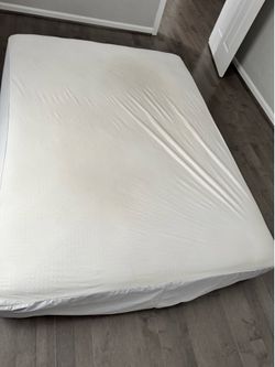 Queen sized beauty rest bed.