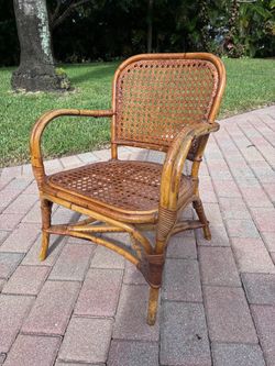Antique children’s Rattan armchair
