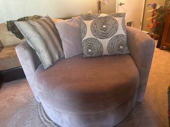 Large spinning cuddler couch