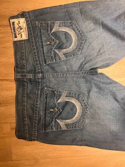 Blue light wash true religion jeans