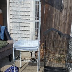 2 bird cages I black 1 white