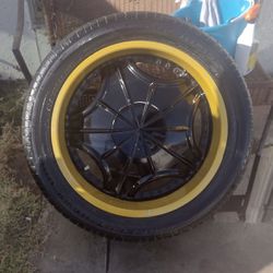 22” Black And Gold Rims And Tires