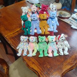 Assortment of 13 vintage beanie babies
