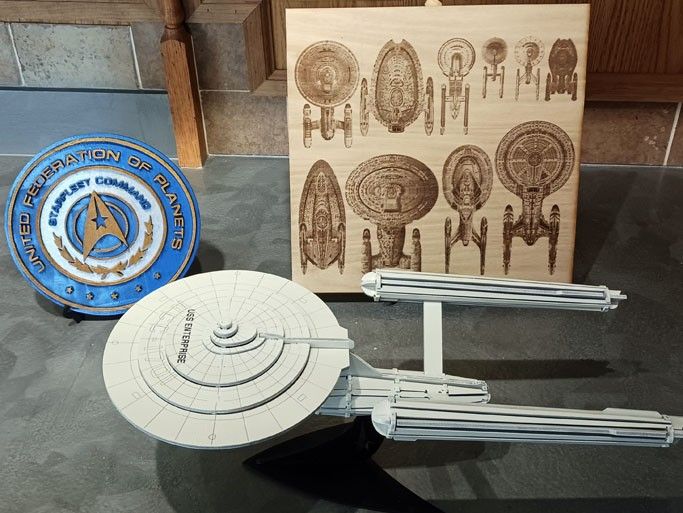 Laser cut starship Enterprise & placks