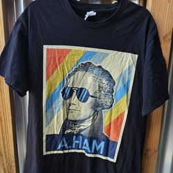 Hamilton t shirt
On PORT COMPANY TAG
Size Large 
Excellent condition 
No rips or stains 