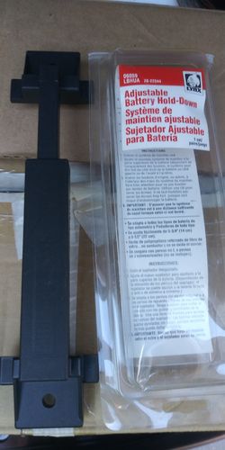 A,ADJUSTABLE BATTERY HOLD-DOWN
