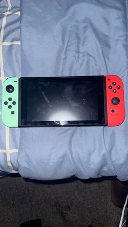 Nintendo Switch with Mint and Red Joy-Cons