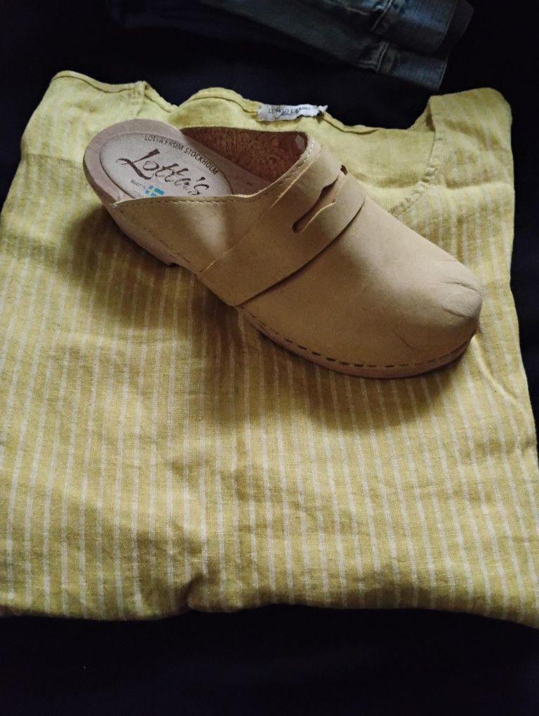 Yellow stripe linen shirt and yellow clogs.