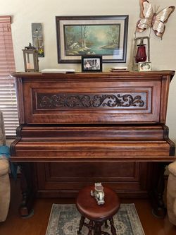 Antique Upright Piano with Carved Wood Detail