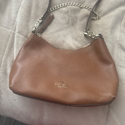 Authentic Kate Spade New York pebbled leather shoulder bag in a beautiful warm cognac brown.