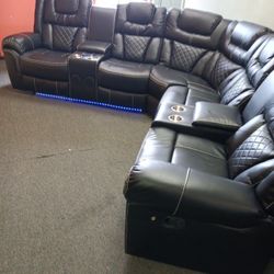 New Alexa, black leather reclining sectional with Bluetooth speaker, USB ports and free delivery