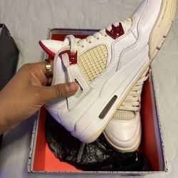 Metallic Red Jordan 4 Retro 