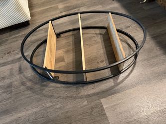 Wooden shelf with black hardware