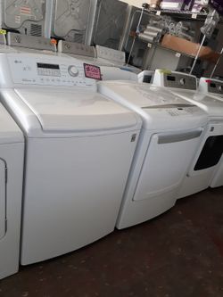 LG top load washer and dryer set working perfectly with 4 months warranty
