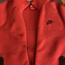 Reddish Nike Tech