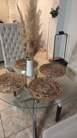 Glass table only (chairs not included)