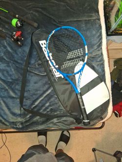 A tennis racket with the case