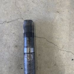Jeep XJ Dana 30 axle shafts, rotor shields and wheel hubs.