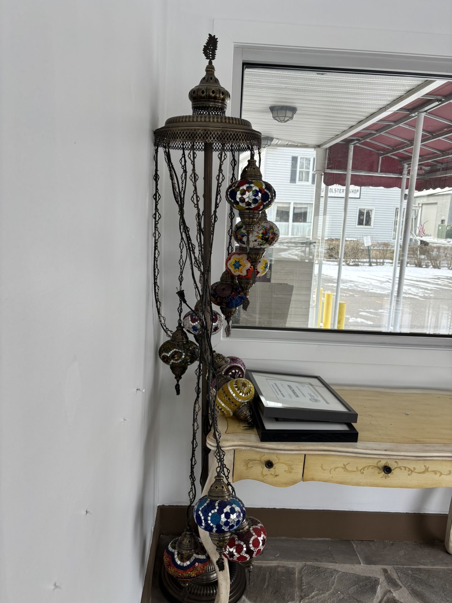 Beautiful lamps for sale, 250 for both. They were used for two months in the entrance of a restaurant; the new owner doesn't need them.