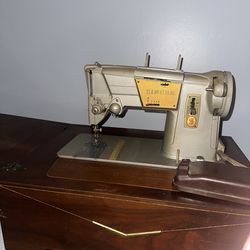 Vintage Singer Sewing Machine with cabinet
