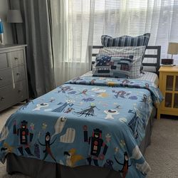 Gray twin bed - sparingly used great condition