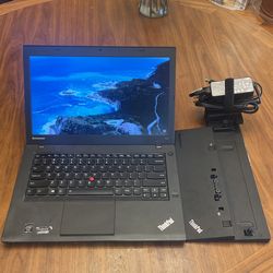 Lenovo ThinkPad laptop with docking station