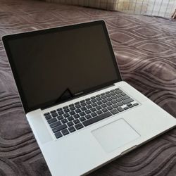 Mac Boook Pro 15.4" Intel Quadcore i7 8gb Ram 256ssd Working Great 