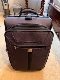 SUITCASE  15"w x 9"deep x 21 1/4"tall; cross streets are Arapaho & Waterview