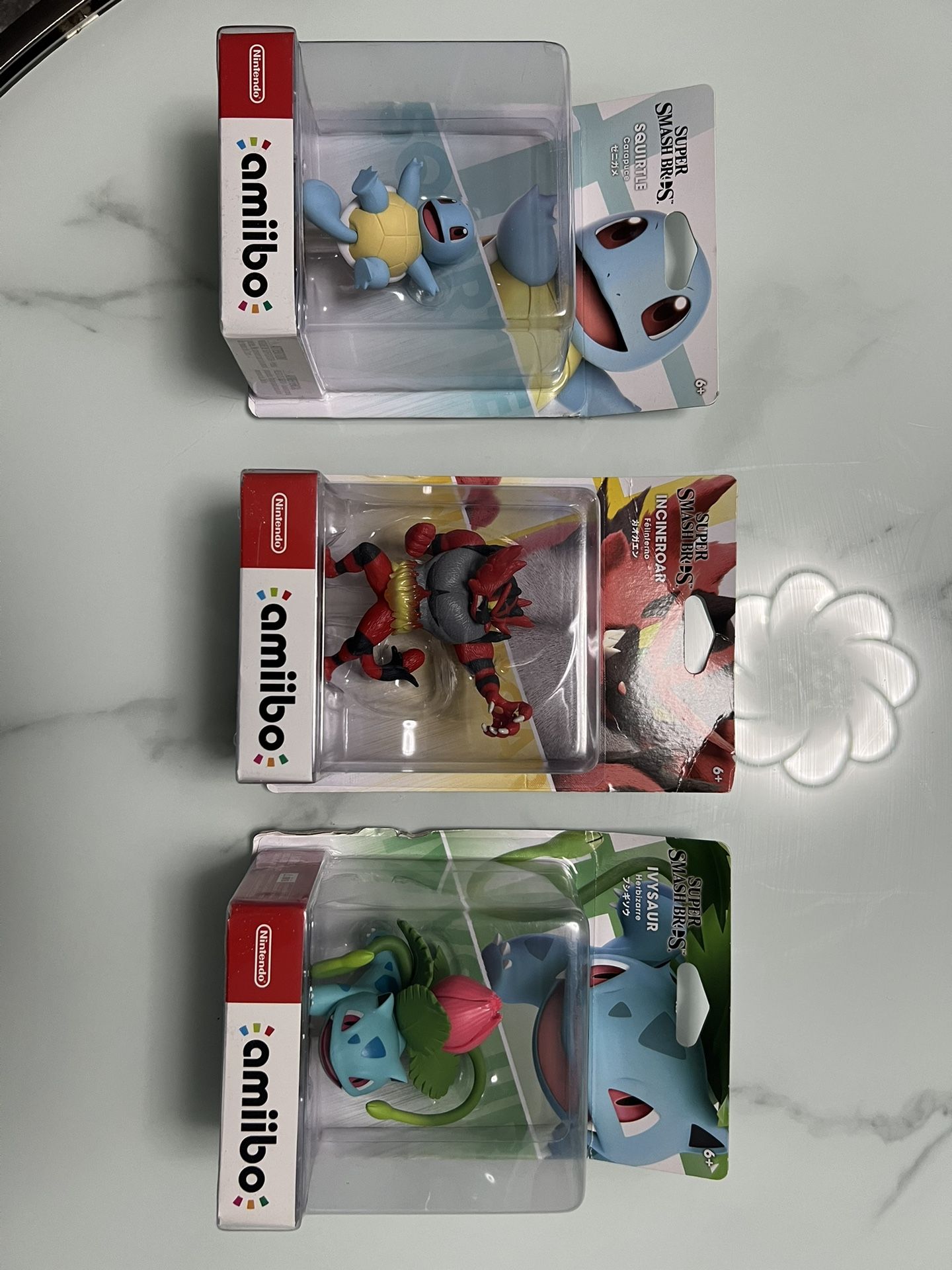 super smash bros Incineroar, Squirtle, and Ivysaur amiibo