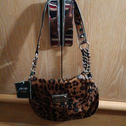 My brand new leopard purse,I am getting rid of some things.