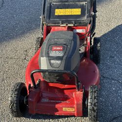 Toro Commercial Mower Self Propel With Two Batteries, 10 Amp And Charger Works Perfect and Green works 80 V Paul edger and chainsaw with battery