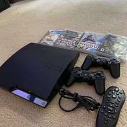 PlayStation 3 Slightly Used With 2 Controllers, Remote and Games