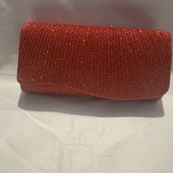 Red glitty clutch