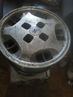 Nissan rims 14 inch 4 log