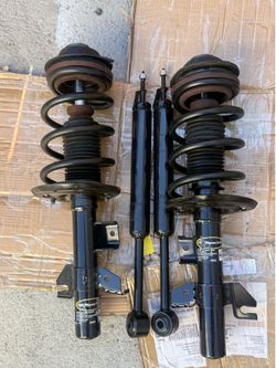 Front struts and rear shocks for jeep Cherokee