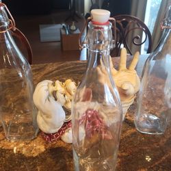 Three 33 Oz Glass Bottles With 2 Chef Bottle Holders.