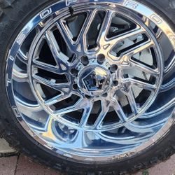 22" TIS WHEELS  22X12.5 ON 35 TIRES MAKE OFFER